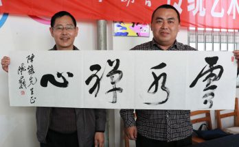 何晓巍参加书法进校园活动走进上安镇学校缩略图
